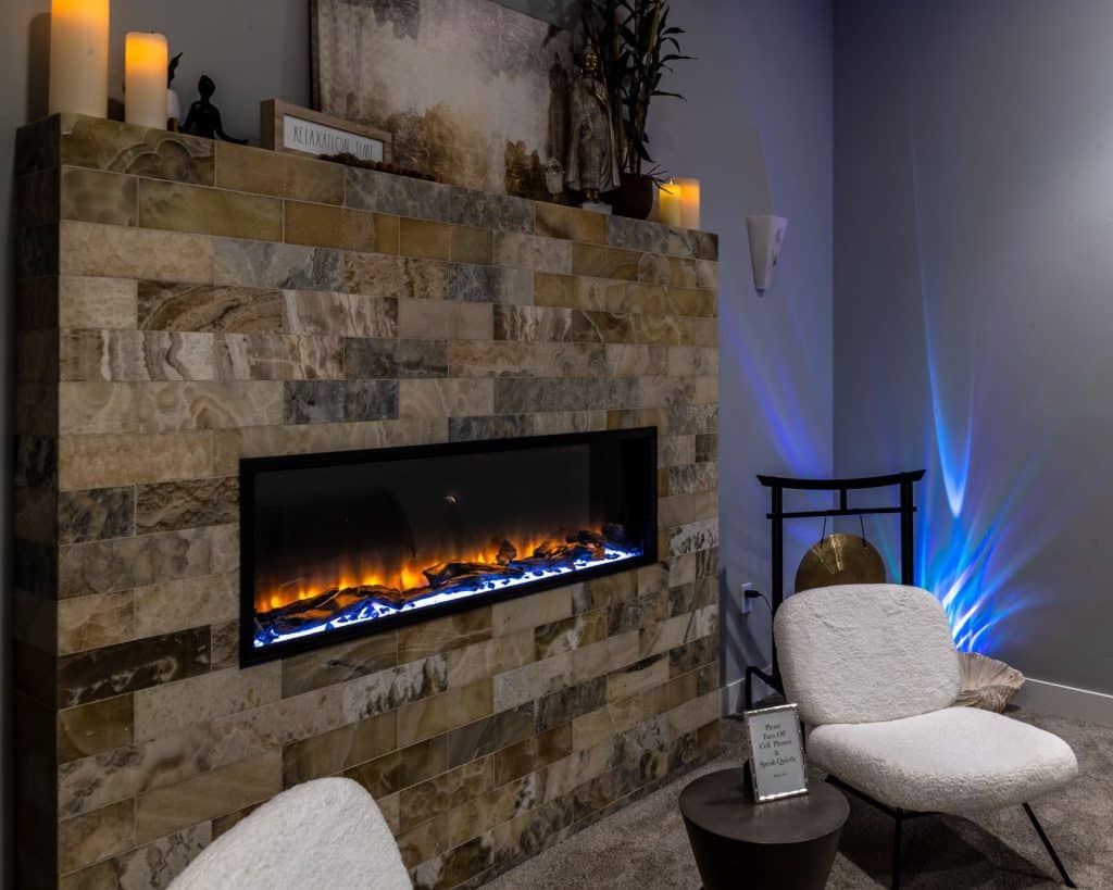 Fireplace in the massage therapy room at Mountain Elite Massage